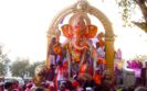 The effigy of Ganesh being led to the sea.